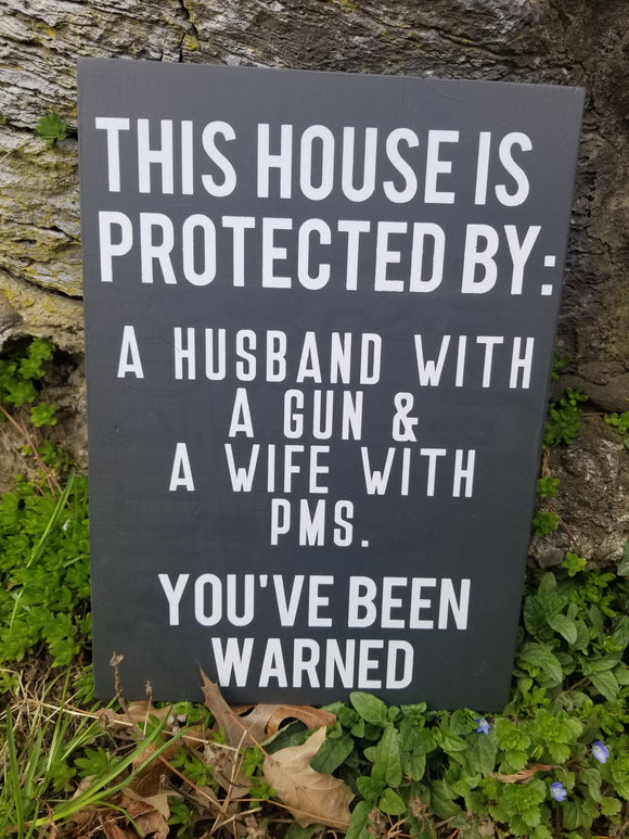 This House Is Protected By: Sign